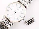 a silver watch with roman numerals on the bracelet