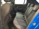 a blue car with a black seat belt in the back of it