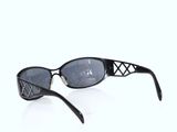 a pair of sunglasses that are sitting on a white surface