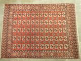 an orange and blue rug with a pattern on it
