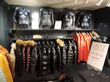many jackets and jackets on display in a store