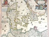 an old map of the british isles with ships in the water
