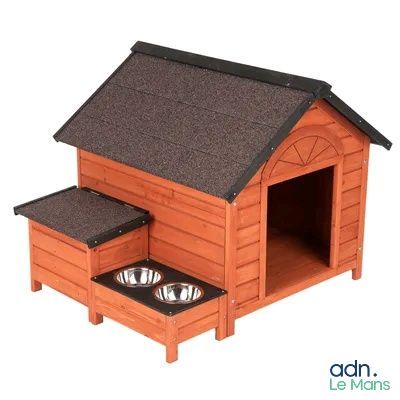 an image of a wooden dog house with two bowls in it