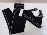 a close up of a pair of leggings and a bra top
