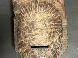 a piece of wood that has been cut in half