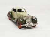 a toy car that is sitting on a white surface