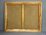 an old wooden frame with a brown fabric covering it