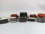 many different types of cameras sitting on a table