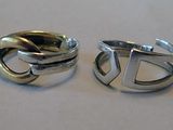 two rings that are sitting next to each other on a table