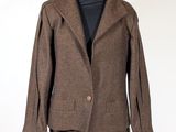 an image of a brown suit on a mannequin mannequin stand