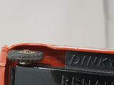 a close up of a red toy truck with a sign on it