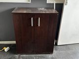 a cabinet in the corner of a room that is being remodeled