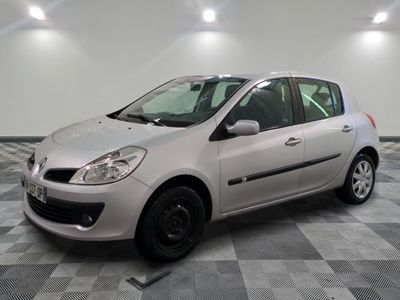 a picture of a white car parked in a garage