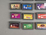 a lot of nintendo game cartridges sitting on a table