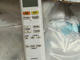 a remote control sitting on top of a plastic bag