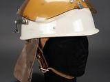 an image of a helmet on a mannequin head on a black surface