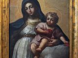 a painting of a woman holding a child in her lap