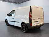 a white van that is parked in a room