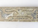 an image of a piece of pottery with a face on it