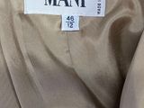 the label of a man ' s suit on a mann mann mann mann mann mann mann mann mann mann mann mann mann mann mann mann mann mann mann mann mann mann