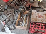 a lot of tools that are sitting on a table