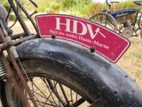 a close up of a motorcycle with a sign on it