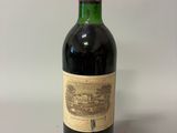 a bottle of wine that is sitting on a table