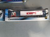 two toy trucks that are sitting next to each other