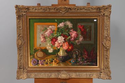 une peinture de fleurs dans un vase sur un chevalet
