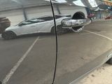 a reflection of a car in the side mirror of a car