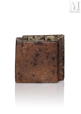 an image of a piece of soap sitting on top of a white surface