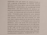 a close up of an open book with writing on it
