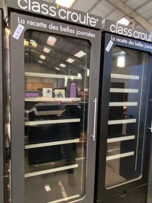 two glass doors that are open in a store