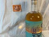 a bottle of liquor that is sitting on a table