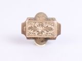 an image of a gold ring with a design on it