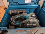 a blue tool box with tools inside of it