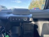 a close up of a car dashboard with a key in it