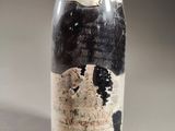 a bottle of wine that is sitting on a table