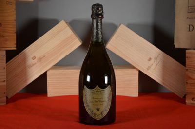 a bottle of wine that is sitting on a table