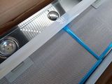 a close up of a metal grill in a car