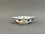 an image of a blue and white bowl with flowers on it