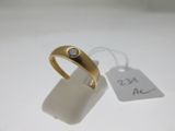 an image of a gold ring with a diamond on top of it