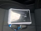 a book with a picture of a car and a remote control