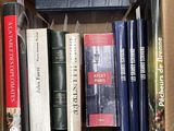 a box full of books that are sitting on a table
