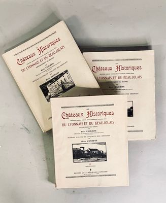 three books sitting on top of a white table next to each other