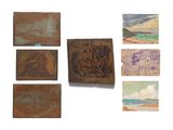 Plusieurs types de tableaux sont exposés sur une surface blanche