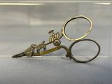 a pair of scissors that are sitting on a table