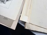 a person that is drawing a picture on a piece of paper