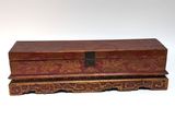 an image of a wooden box sitting on top of a white surface