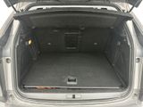 a trunk of a car with the back door open